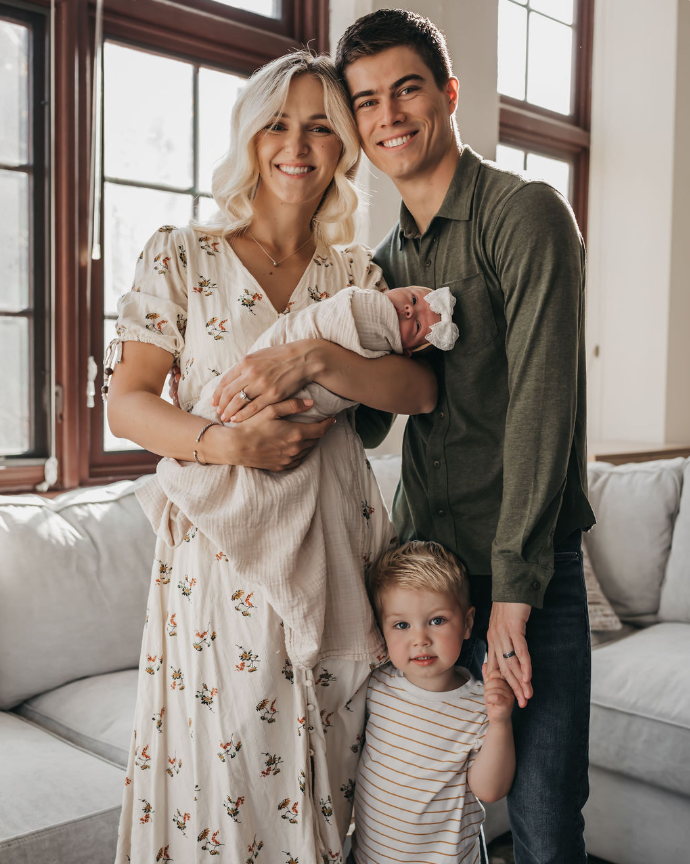Matt Orlandi with his wife and two children at home